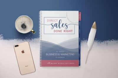 Image of Chic Influencer's Direct Sales Done Right 52 Week Planner presented with a cup of coffee, an iPhone, and a feather pen.